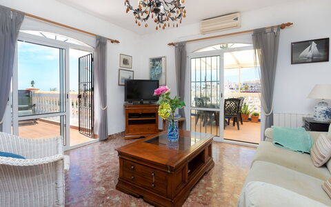 Nerja Penthouse: Tabelle, Möbel, Eigentum, Blau, Pflanze, Azurblau, Cabinetry, Couch, Interior Design, Holz