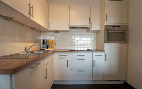 Zeeparel 402 with Balcony: Countertop, Küche, Küchengerät, Cabinetry, Flooring, Interior Design, Major Appliance, Holz, Fussboden, Haushaltsgerät