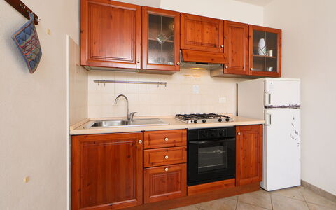 Avocado: Braun, Cabinetry, Sinken, Spüle, Countertop, Möbel, Eigentum, Zapfhahn, Gebäude, Holz