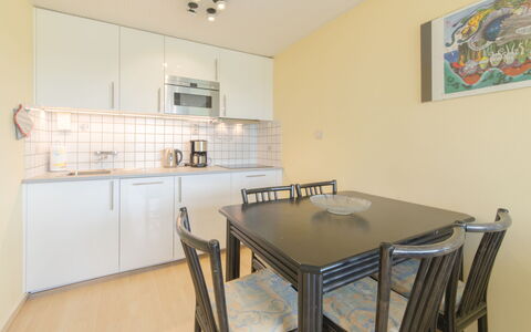 Maya - Parking and Distant View: Möbel, Tabelle, Eigentum, Cabinetry, Countertop, Stuhl, Holz, Interior Design, Bilderrahmen, Küche & Esszimmer Tisch