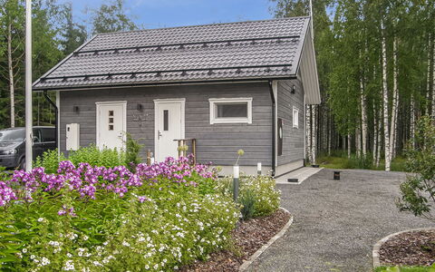 Villa Paasirinne a: Haus, Hütte, Zuhause, Strauch, Dach, Abstellgleis, Ground, Gartenbauten, Garten, Garten