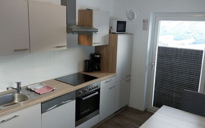 Radstadt 606: Cabinetry, Eigentum, Möbel, Spüle, Sinken, Countertop, Holz, Herd, Interior Design, Beleuchtung