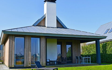 Oesterdam Resort: Möbel, Tabelle, Gebäude, Stuhl, Geschirr, Wolke, Himmel, Tischdecke, Gartenmöbel, Schatten