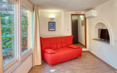 Portovecchio Apartments - Levanto: Interior Design, Möbel, Flooring, Holz, Fussboden, Zimmer, Decke, Couch, Wohnzimmer, Wohnung
