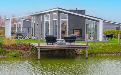 Wemeldinge 220: Wasser, Himmel, Pflanze, Eigentum, Gebäude, Die Architektur, See, Gewässer, Urban Design, Wohngebiet