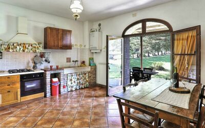 Girasole: Cabinetry, Möbel, Eigentum, Countertop, Tabelle, Fenster, Stuhl, Holz, Küche, Interior Design