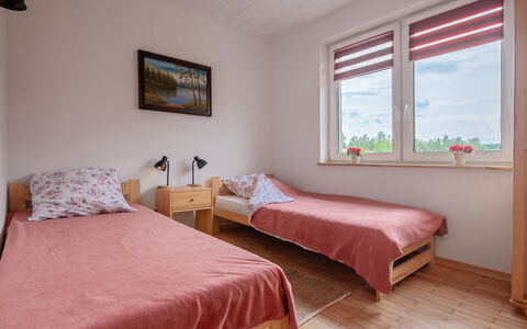 Zagroda Nad Krutynią: Holz, Schlafzimmer, Bett, Zuhause, Fussboden, Bettdecke, Bettrahmen, Bedding, Wohnheim, Zimmer