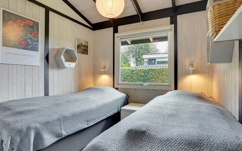 Malwina - 800M from the Sea: Holz, Decke, Interior Design, Fussboden, Schlafzimmer, Bett, Light Fixture, Bettrahmen, Design, Bedding