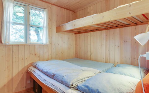 Svenja - 600M from the Sea: Schlafzimmer, Bett, Holz, Etagenbett, Flooring, Fussboden, Bettdecke, Interior Design, Bedding, Decke
