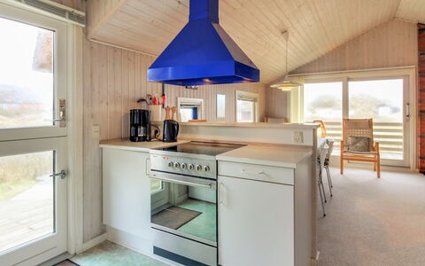 Telia - 250M from the Sea: Holz, Decke, Küche, Interior Design, Flooring, Light Fixture, Möbel, Zimmer, Fussboden, Countertop