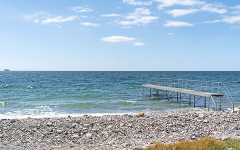 Henrik - 100M from the Sea: Schwimmbad, Gartenmöbel, Möbel, Resort, Flagstone, Eco Hotel, Schatten, Stuhl, Freizeit, Estate