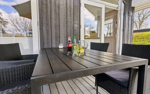 Gunholm - 150M from the Sea: Blau, Strauch, Hütte, Ground, Garten, Estate, Schatten, Landscaping, Bauernhaus, Eco Hotel