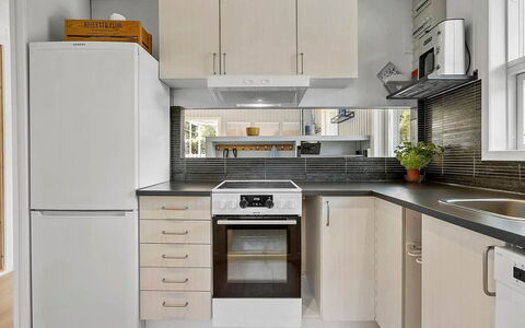 Kjartan - 1.2Km from the Sea: Küchengerät, Küche, Countertop, Cabinetry, Major Appliance, Haushaltsgerät, Möbel, Flooring, Interior Design, Holz