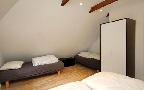 Rigitte - 1.5Km from the Sea: Bett, Schlafzimmer, Fussboden, Flooring, Bedding, Bettdecke, Holz, Interior Design, Möbel, Zimmer