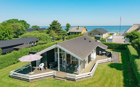 Maybritt - 100M from the Sea: Blau, Strauch, Hütte, Ground, Garten, Estate, Schatten, Landscaping, Bauernhaus, Eco Hotel