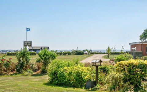 Kaike - 100M from the Sea: Blau, Strauch, Hütte, Ground, Garten, Estate, Schatten, Landscaping, Bauernhaus, Eco Hotel