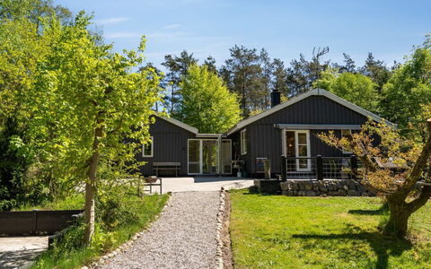 Hunding - 7Km from the Sea: Wohnung, Schatten, Balkon, Stuhl, Zaun, Gartenmöbel, Aluminium, Kunstrasen
