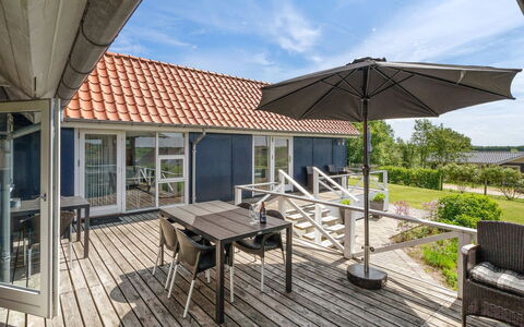 Edvia - 700M to the Fjord: Deck, Schatten, Hartholz, Gartenmöbel, Veranda, Planke, Estate, Stuhl, Holzbeize, Design