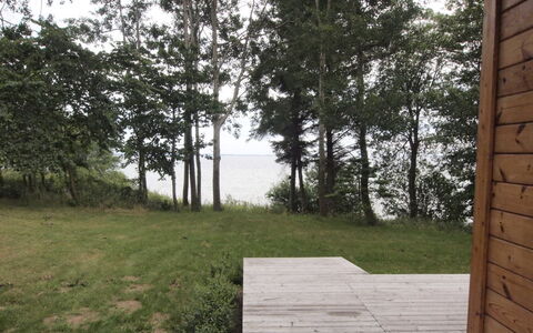 Pirjo - 50M from the Sea: Dach, Haus, Grundstueck, Zuhause, Hütte, Estate, Gartenbauten, Schatten, Blockhaus, Landscaping