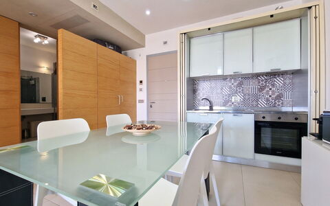 Suite Le Vele: Möbel, Interior Design, Flooring, Fussboden, Holz, Küche, Countertop, Küchengerät, Decke, Major Appliance