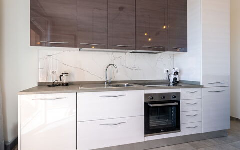 Casa Clio: Cabinetry, Countertop, Küche, Flooring, Möbel, Holz, Küchengerät, Schublade, Interior Design, Zuhause