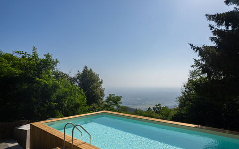 Casa Serra: Wasser, Himmel, Pflanze, Azurblau, Schwimmbad, Gebäude, Baum, Schatten, Haus, Natürliche Landschaft