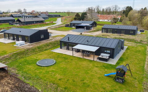Jul - 300M from the Sea: Blau, Strauch, Hütte, Ground, Garten, Estate, Schatten, Landscaping, Bauernhaus, Eco Hotel