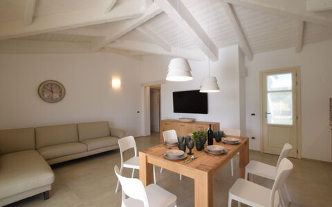 Villa Helios - Budoni, Sardegna: Möbel, Eigentum, Tabelle, Couch, Beleuchtung, Holz, Interior Design, Fenster, Wohnzimmer, Komfort