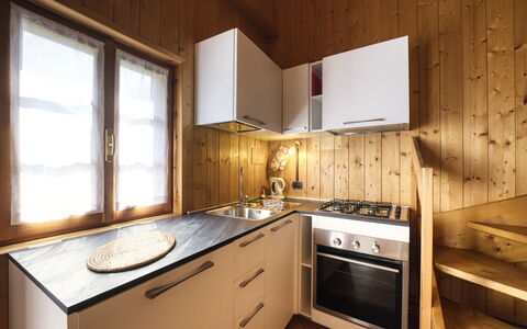 Incanto Walser Apartments Testa: Countertop, Cabinetry, Eigentum, Gebäude, Möbel, Fenster, Sinken, Küche, Schublade, Holz