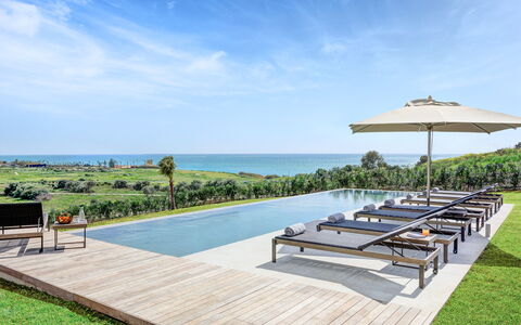 Villa Corallo - Sea Front | By Rocco Forte Villas: Himmel, Wolke, Wasser, Pflanze, Gartenmöbel, Schatten, Baum, Strandresort, Freizeit, Eco Hotel