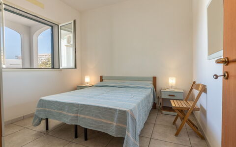 Andromeda Apartment In Gallipoli: Eigentum, Möbel, Komfort, Fenster, Holz, Gebäude, Textil, Bett, Flooring, Interior Design