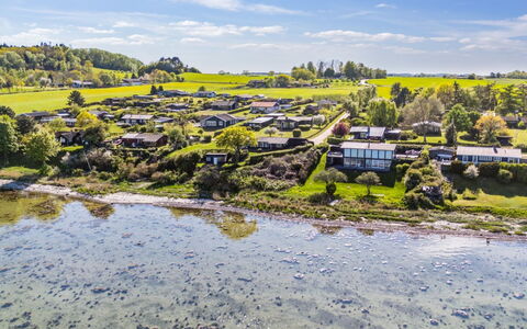 Titta - 10M to the Fjord: Blau, Strauch, Hütte, Ground, Garten, Estate, Schatten, Landscaping, Bauernhaus, Eco Hotel