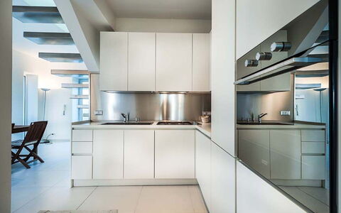 Cala Marina: Küche, Küchengerät, Interior Design, Countertop, Flooring, Cabinetry, Major Appliance, Decke, Fussboden, Die Architektur