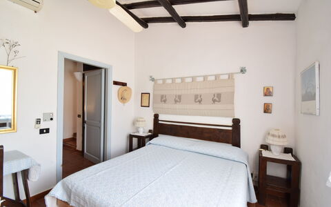 Villetta Oasi Belvedere, Budoni, Wifi, Ac: Möbel, Interior Design, Wand, Schlafzimmer, Holz, Bett, Flooring, Fussboden, Decke, Beleuchtung