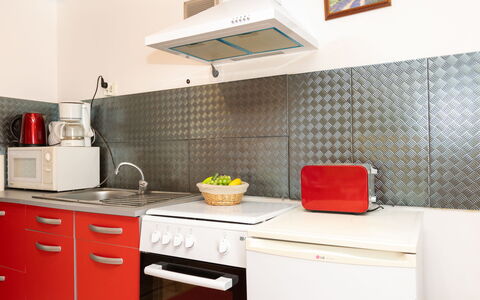 Les Jardins: Küchengerät, Küche, Major Appliance, Flooring, Herd, Countertop, Interior Design, Haushaltsgerät, Fussboden, Herd