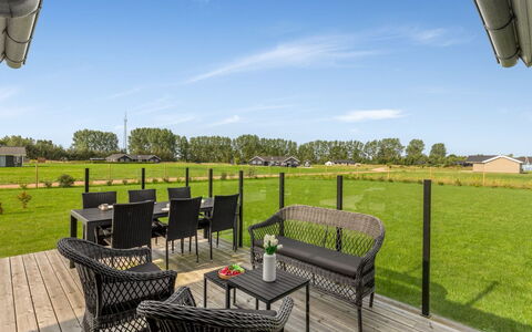 Hellevi - 900M from the Sea: Himmel, Grundstueck, Gartenmöbel, Stuhl, Tisch Im Freien, Rasen, Hartholz, Schatten, Küche & Esszimmer Tisch, Deck