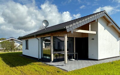 G6 Freistehendes Haus mit Garten und Wallbox