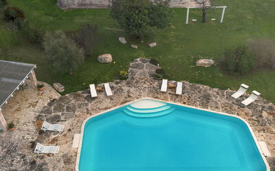Trulli Experience, Pool, Monopoli: Schwimmbad, Freizeit, Erholung, Urlaub, Gartenmöbel, Resort, Flagstone, Villa, Hazienda, Water Feature
