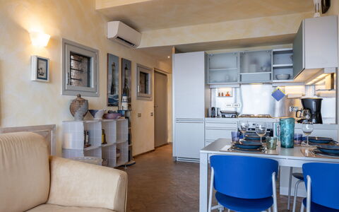 Stella Marina Apartment with Pool, Porto Santo Ste: Möbel, Interior Design, Flooring, Zimmer, Fussboden, Wohnung, Decke, Tabelle, Beleuchtung, Stuhl