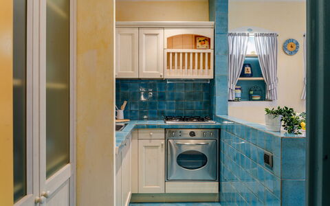 Suite la Torre: Küche, Countertop, Küchengerät, Major Appliance, Interior Design, Flooring, Cabinetry, Fussboden, Zimmer, Haushaltsgerät