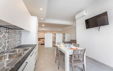 Appartamento Monomare, Gallipoli: Flooring, Fussboden, Interior Design, Decke, Countertop, Küche, Zimmer, Wohnung, Major Appliance, Holzboden