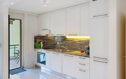 Apt. Hermosa: Küche, Countertop, Flooring, Küchengerät, Interior Design, Major Appliance, Holz, Fussboden, Möbel, Cabinetry