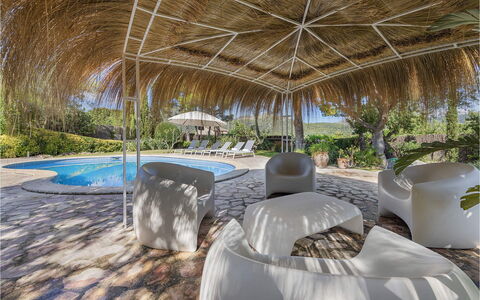 Can Cabana: Gartenmöbel, Möbel, Schwimmbad, Resort, Schatten, Stuhl, Eco Hotel, Regenschirm, Landscaping, Sonnenliege