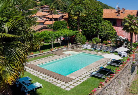 Mariuccia 1: Schwimmbad, Resort, Gartenmöbel, Freizeit, Eco Hotel, Hazienda, Regenschirm, Hotel, Ferienort, Villa