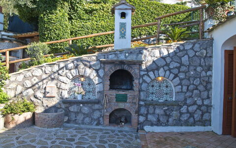 Casa 2 Ulivi: Steinwand, Garten, Blumentopf, Landscaping, Cobblestone, Flagstone, Treppe, Zimmerpflanze, Hazienda, Water Feature