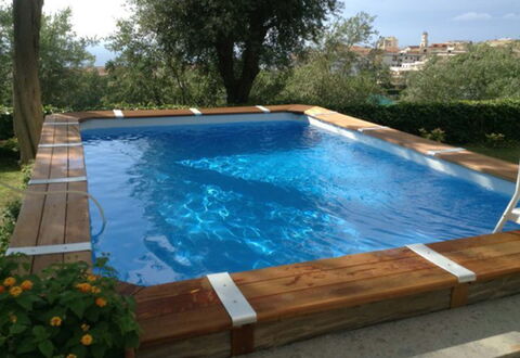 Villa Torre del Sole: Schwimmbad, Verbundwerkstoff, Freizeit, Holzbeize, Hinterhof, Hartholz, Water Feature
