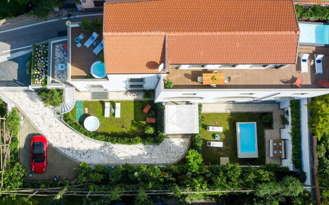 Suite Plumbago: Wohngebiet, Haus, Zuhause, Nachbarschaft, Dach, Urban Design, Landscaping, Estate, Garten, Vorort
