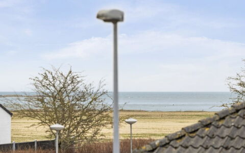 Seved - 440M from the Sea: Wohnung, Schatten, Balkon, Stuhl, Zaun, Gartenmöbel, Aluminium, Kunstrasen