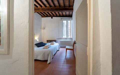 Le Loggine del Pignatello Apartment, Siena City: Wand, Holz, Decke, Flooring, Schlafzimmer, Interior Design, Fussboden, Bettdecke, Zimmer, Bett