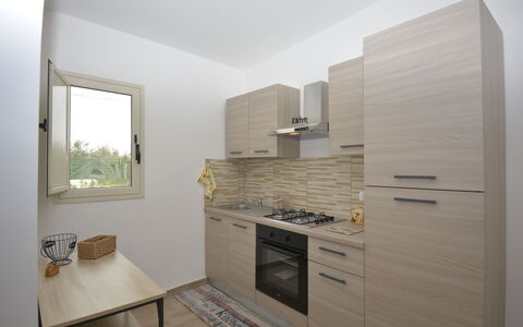 Villa Cosentini: Wand, Küchengerät, Major Appliance, Countertop, Küche, Holz, Interior Design, Flooring, Cabinetry, Fussboden